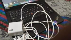 Customer reviews of GaN charger praising compact design, fast charging, reliability, and value for money.